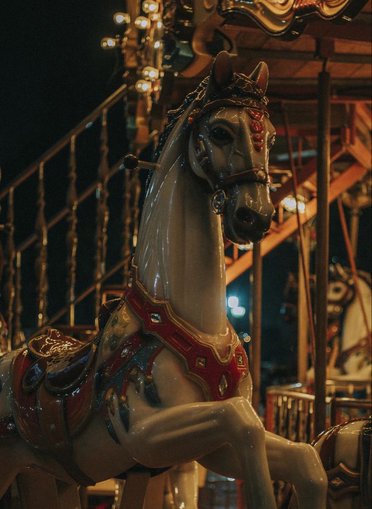 a merry go round horse is on display