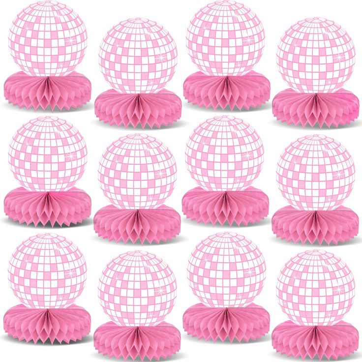 a set of twelve pink tissue balls with some white squares on the top and one in the middle