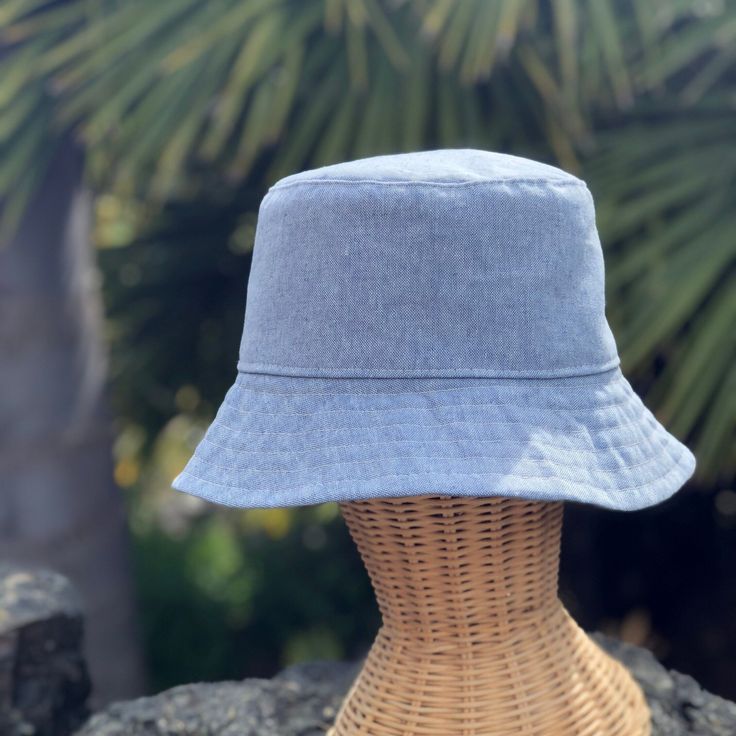 The perfect weekend bucket hat! Made from a light blue linen blend fabric. This hat is very comfortable to wear. A great sun hat for women or men. I made this hat with a day of adventure in mind, somewhere sunny and wild! For baby or kid version of this hat, see link below. This hat is made from a blue linen and cotton blend fabric. Inside liner is white cotton. Interfacing inside brim for extra shape. Brim measures approx. 2.5" wide. Crown measures approx. 3.5" deep. Available in sizes: S - measures 22.5" (fits heads with circumference of 21" to 22" best) M- measures 23" ( fits heads with circumference of 21.5 to 22.5" best) L- measures 23.5" (fits heads with circumference of 22" to 23" best) CUSTOM FIT: please contact me with head measurements. Custom fit hats are not eligible for return Custom Fitted Hats, Sun Hats For Women, Hat For Women, Summer Hats, Sun Hat, Fitted Hats, Sun Hats, Custom Fit, White Cotton