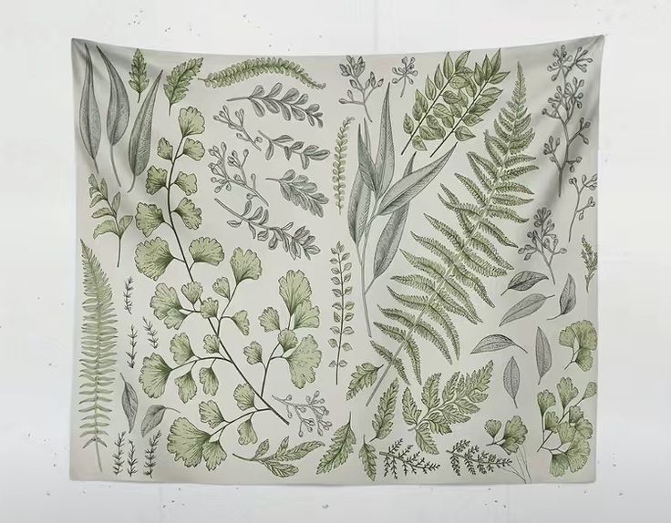 a green and white wall hanging with various plants on it's side, in front of a white background