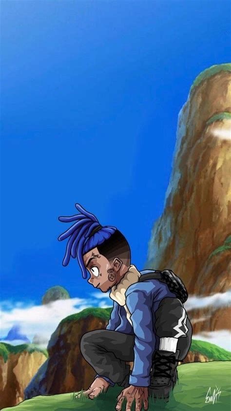 a person kneeling down in front of a mountain with blue hair and dreadlocks