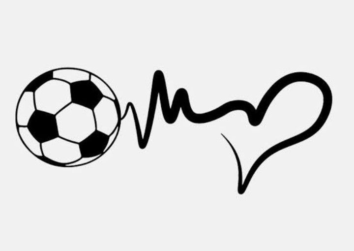 a soccer ball with the word love written on it and a heart in the background