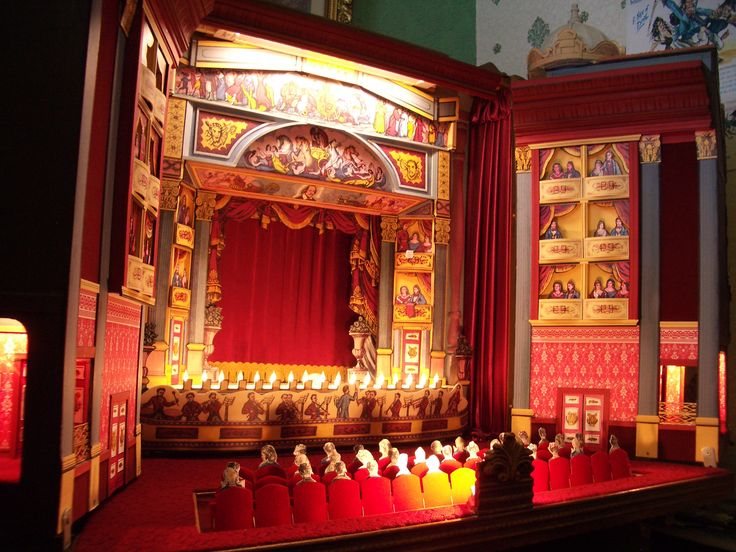 the stage is decorated with red and yellow candles