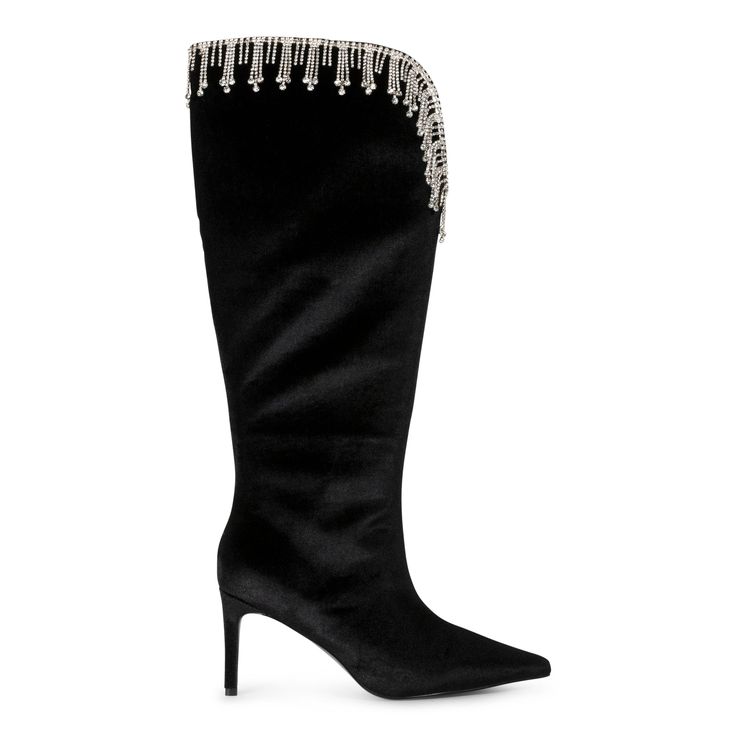 A showstopping boot with gorgeous ornate beading at the collar! Be ready for all of the looks when you wear these out! Heel height: 3.5" Material: Velvet, Faux crystal beading Chic Embellished Heeled Boots For Formal Occasions, Chic Embellished Heeled Boots For Evening, Elegant Embellished Heeled Boots, Luxury Embellished Boots For Fall, Winter Formal Embellished Boots, Glamorous Winter Boots With Rhinestone Fringe, Elegant Embellished Heeled Boots For Night Out, Chic Embellished Heeled Boots For Night Out, Winter Boots With Rhinestone Fringe