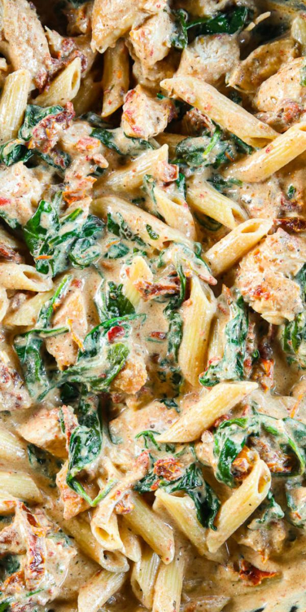 pasta with chicken and spinach in a creamy sauce