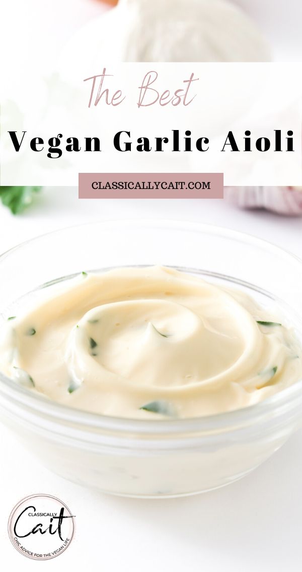 the best vegan garlic aiolie in a glass bowl on a white table