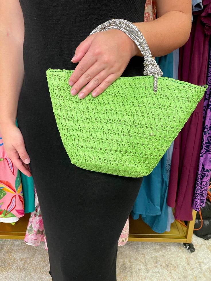 Introducing The Gaia: a playful, woven straw tote with a magnetic snap closure and sparkling rhinestone knotted top handle. Versatile and functional, it features a detachable chain strap and a fabric-lined interior with one zip and one slip pocket. Perfect for adding a touch of whimsy to any outfit. Chic Green Shoulder Bag With Braided Handles, Trendy Green Woven Bag, Chic Green Intrecciato Weave Shoulder Bag, Green Shoulder Bag With Braided Handles For On-the-go, Bohemian Green Basket-shaped Bag, Knotted Top, Pistachio Color, Moon Dress, Flying Monkey