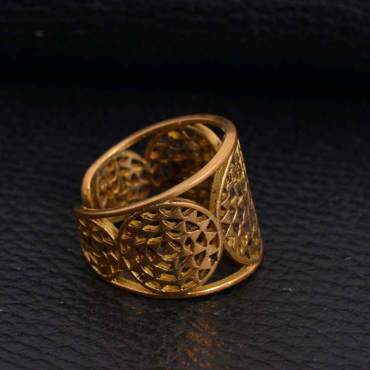 Handmade PRODUCT CODE :- HA1 Material :- brass Size :- Any Adjustable Sri Yantra Ring Gold ring Sacred Geometry Jewelry Shree Yantra Ring/ Indian Tribal/ Adjustable ring/ Triangles ring We Crafted These in 100% Solid Brass These Simple rings are perfect for any occasion. ~ Make a Statement with these minimal yet simple Unique Rings. Please make sure ti include the correct address during before order. You can return item with in 10 days after successful delivery. We offer 100% Money back guarante Adjustable Symbolic Festival Rings, Adjustable Brass Rings For Festivals, Handmade Adjustable Bohemian Filigree Ring, Handmade Bohemian Filigree Adjustable Ring, Color Wheel Design, Shree Yantra, Sacred Geometry Jewelry, Geometry Jewelry, Ring Indian