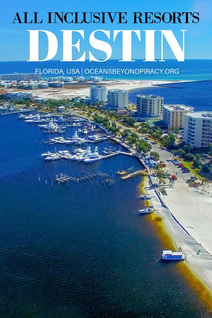 an aerial view of the beach and marina in destin, florida with text that reads all inclusive resort's