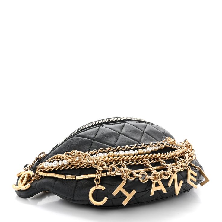 This is an authentic CHANEL Lambskin Quilted All About Chains Waist Belt Bag in Black. This stylish waist bag is finely crafted of diamond quilted black lambskin leather with multi strand aged gold and pearl strands with Chanel initials charms. The bag features an aged gold chain link and leather belt strap waist strap with adjustment links and a top zipper pocket with a Chanel CC zipper pull. This opens to gold leather interior with a zipper pocket. Chanel Belt Bag, Waist Belt Bag, Ribbon Quilt, Chanel Crossbody, Chanel Tweed, Chanel Caviar, Chanel Belt, Waist Strap, Pearl Strands