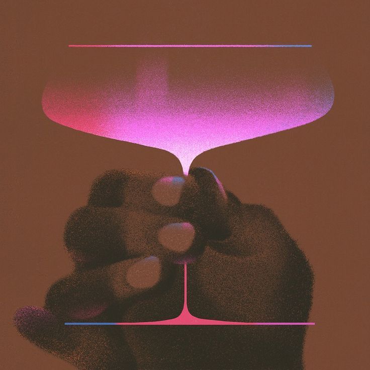 a person holding a wine glass in front of a pink and purple light that is shining