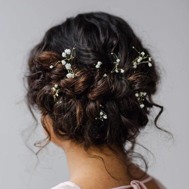 a woman with flowers in her hair