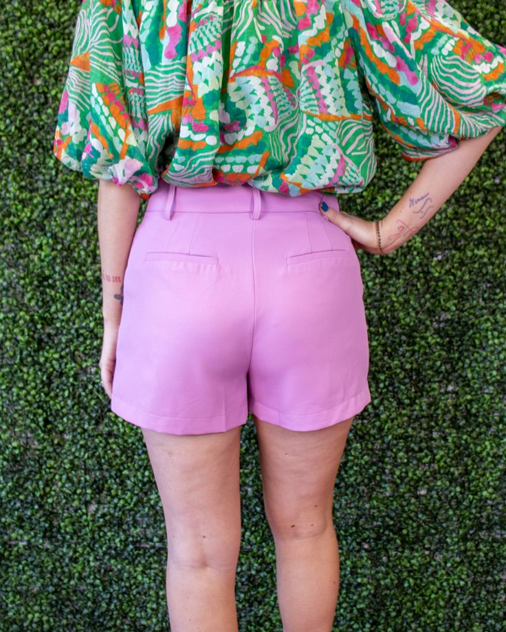 Get ready to bask in style with our Sunset Sorbet Shorts. Perfectly tailored with belt loops and pockets for all your essentials. These shorts will keep you feeling cool, comfortable, and looking fabulous all summer long. Don't miss out on the perfect addition to your wardrobe! Purple model: Jordan 5’10” is a size 8 wearing a medium Fitted Short Belted Bottoms, Fitted Belted Short Bottoms, Fitted Summer Shorts With Pockets, Fitted Belted High-waisted Shorts, Trendy Summer Bottoms With Belt Loops, Summer Bermuda Shorts With Pockets For Day Out, Summer Bermuda Shorts With Elastic Waistband For Spring, Trendy Bottoms With Belt Loops And Short Length, Trendy Spring Pants With Built-in Shorts