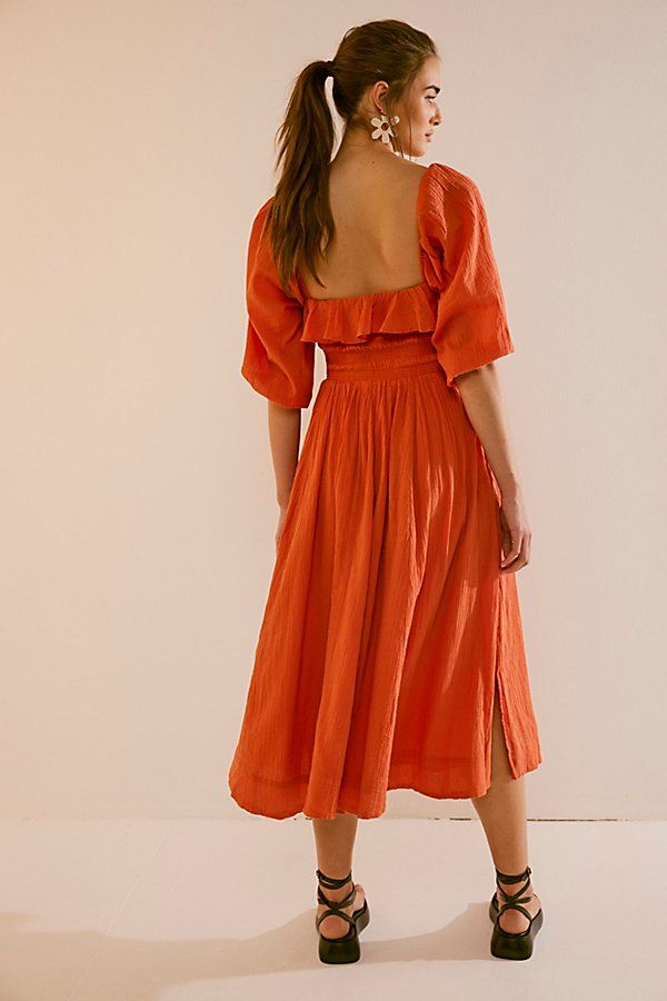 Easy cotton midi dress from our free-est collection featured in a flowy silhouette with a smocked bodice and volume sleeves. * Ruffled neckline * Adjustable tie at bustline * Lined skirt | Oasis Midi Dress by free-est at Free People in Orange, Size: XS Red Mango, Volume Sleeves, Oasis Dress, Ruffled Neckline, Cotton Midi Dress, Red Midi Dress, Beauty Favorites, Silk Velvet, Dress Red