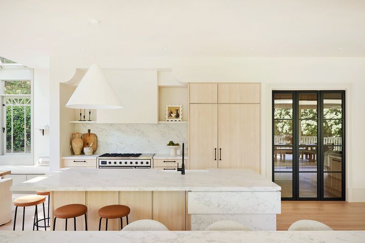 the kitchen is clean and ready to be used as a dining room or family room