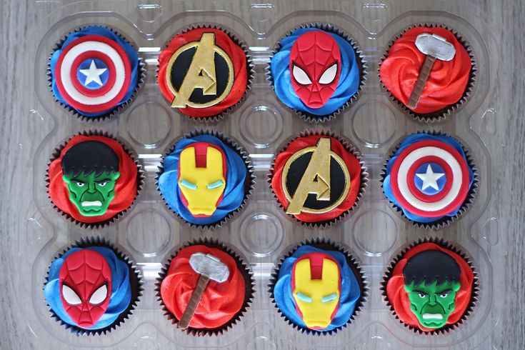 the cupcakes are decorated like superheros