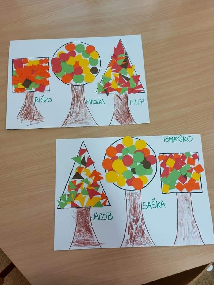 two children's drawings of trees made with colored paper