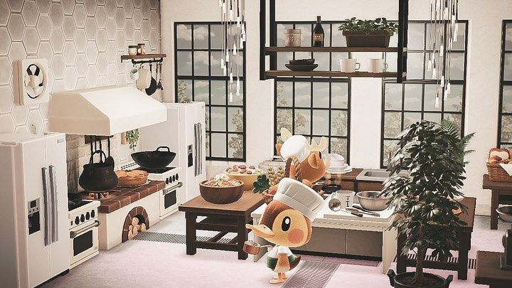 a kitchen filled with lots of appliances and furniture