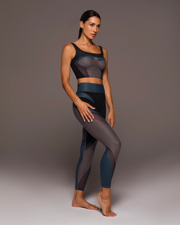 Designer's Notes Statement bustier with mixed metal color-blocking panels and mesh inserts for added ventilation. Crafted in Liquid Gloss fabric for a luxe metallic shine. Wear with the Aerial Gloss Legging for the full effect. Best suited for small to medium busts. Fits small, recommended to size up. Features Sweat-wicking Eight-way stretch Exceptional breathability Removable bra cups provide shape and coverage Mesh insert panels Made with Love in Canada Size & Fit Tight Fit Light Support Round High End Active Wear, Compressive Mesh Back Leggings For Pilates, Compressive Leggings With Mesh Back For Pilates, Compression Nylon Leggings With Mesh Back, Gym Outfits Shorts, Gym Outfit Shorts, Women Gym Outfits, Gym Shorts Outfit, Female Sports