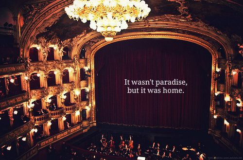 an auditorium with chandeliers and lights that say it was paradise, but it was home