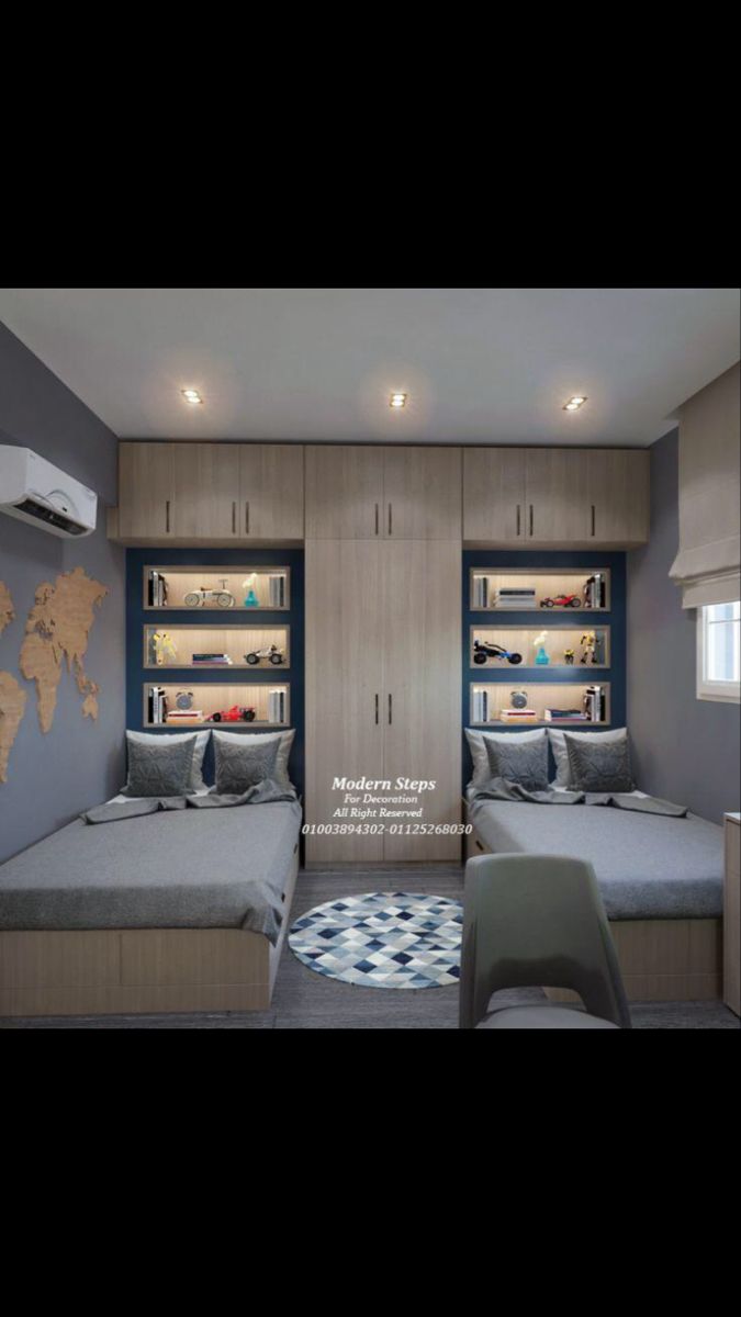 two beds in a room with built - in shelving units and a world map on the wall