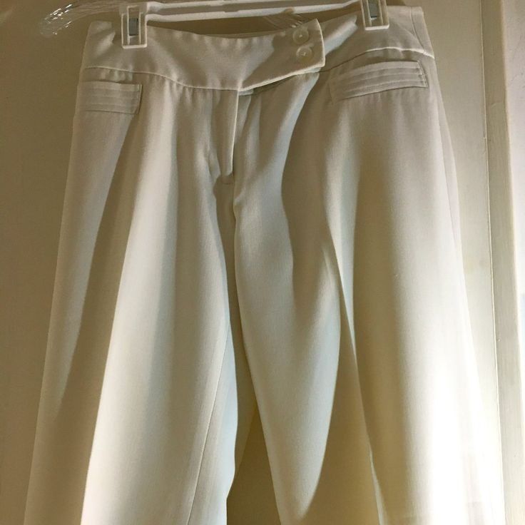 Rafaella Ivory Dress Pant Same Style As Valentino That Retails For $1,890 3" Waistband Side Snaps 2 Vertical Front Pockets Wide 11” Leg Length 39” Side Button Flap With Pearl Buttons 62% Poly, 33% Rayon, 5% Spandex Brand New White Semi-formal Spring Pants, Semi-formal White Spring Pants, Tailored White Bottoms For Semi-formal Occasions, White Semi-formal Spring Bottoms, White Semi-formal Bottoms For Spring, Semi-formal White Bottoms For Spring, Classic White Dress Pants For Semi-formal, Elegant Fitted White Dress Pants, Elegant White Dress Pants For Work