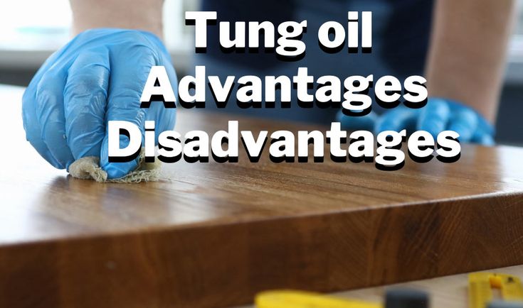 a person in blue gloves is cleaning a wooden table with a sponge on it and the words lunge oil advantages disavantages