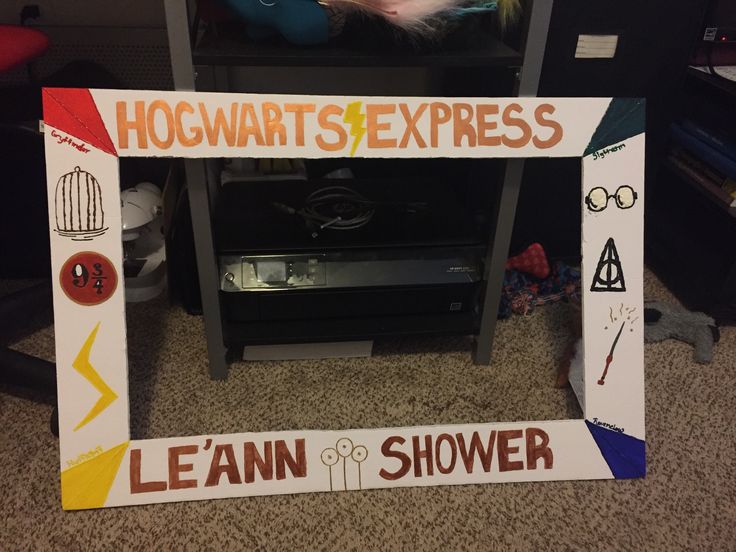 a sign that says harry's express and learn shower on the floor in front of a television