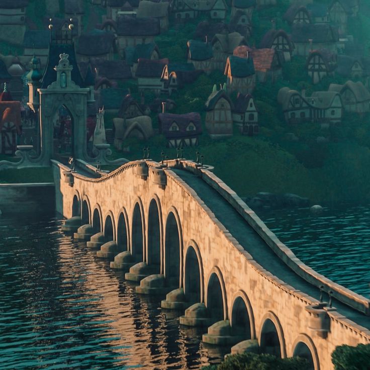 a bridge over water with buildings in the background