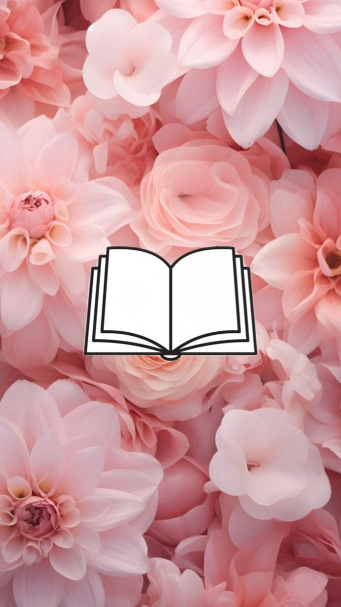 an open book surrounded by pink flowers