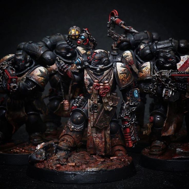 the warhammers are all painted in different colors and sizes, including black with red accents