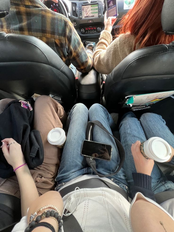 Three friends packed together in the back seat with two up front in driver and passenger seat. Only see legs or arms Car Full Of People Aesthetic, Car Trips With Friends, Friends In A Car Aesthetic, Packed Car Aesthetic, Caravan With Friends, Car Trip With Friends, Friends In The Car Aesthetic, Car With Friends Aesthetic, Car Drives With Friends