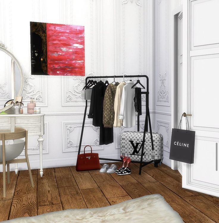 a bedroom with white walls and wooden floors, an open door to a dressing room