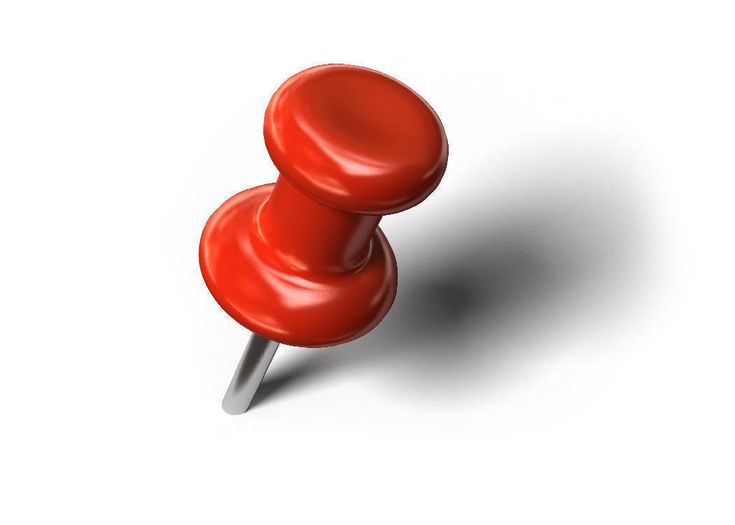 a red push button on a white background