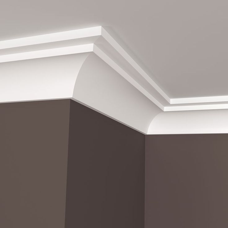 the corner of an empty room with white trim