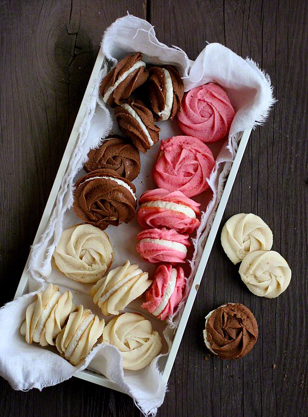 assorted pastries displayed in tray on wooden table