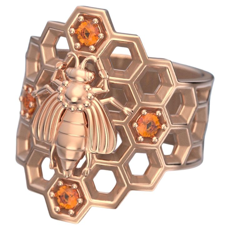 Made to order Bee Ring, Honeycomb Ring in 14k Solid Gold with natural Orange Spessartite Garnet, Italian Gold Jewelry made in Italy. This stunning honeycomb bee ring is made of solid gold and handcrafted in Italy. The ring features a honeycomb design with a central bee, and is available in 14k gold and features 6 natural orange spessartite garnets. The ring is dainty and elegant, and is perfect for everyday wear or for special occasions. Features: Made of solid 18k gold 6 natural orange spessart Bee Rings Jewelry, Honey Comb Jewellery, Luxury Carved Orange Jewelry, Gucci Bee Jewelry, Honeycomb Bracelet, Honeycomb Ring, Italian Gold Jewelry, Bee Ring, Spessartite Garnet