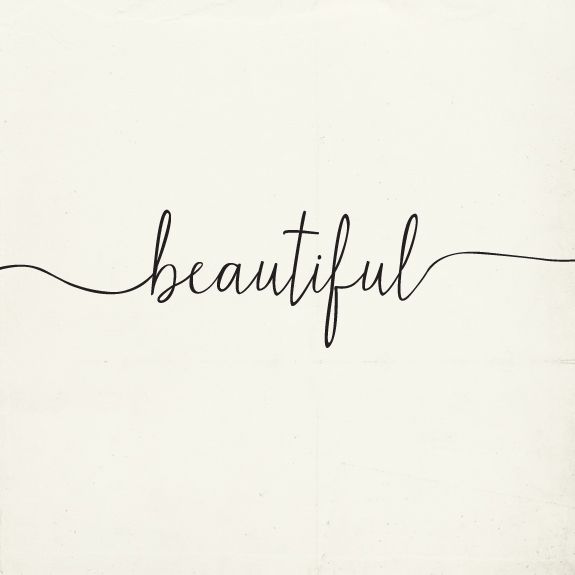 the word beautiful written in cursive handwriting