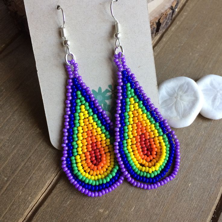 Bohemian Rainbow Beaded Jewelry, Unique Teardrop Earrings With Tiny Beads, Colorful Beaded Hippie Jewelry, Hippie Beaded Jewelry For Crafting, Unique Beaded Teardrop Jewelry, Dangle Teardrop Earrings With Tiny Beads As Gift, Teardrop Beaded Jewelry For Festivals, Purple Teardrop Bohemian Earrings, Gift Teardrop Dangle Earrings With Tiny Beads