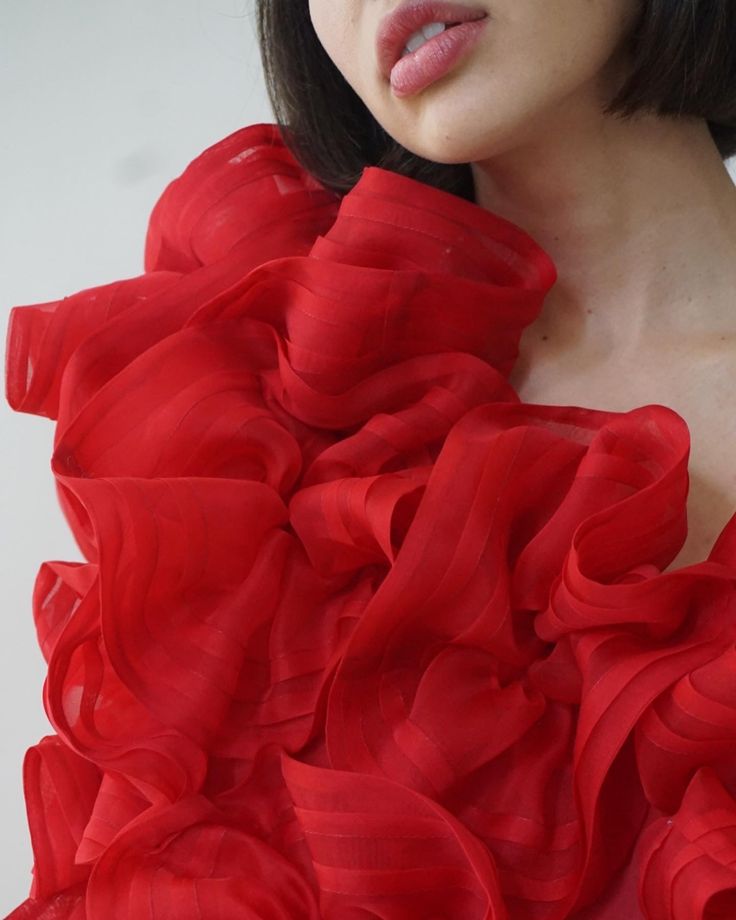 The Ellaella Pouf Dress is a stunning display of haute romance, made to order for special occasions and red-carpet affairs. This bold artful dress is entirely made by hand with couture sewing techniques, with each red silk organza hand-pleated bloom stitched, gathered, and sewn on by our skilled team in New York. 100% silk organza Upon placing your order, please e-mail us at info@jasminechong.com with order number and sizing information. Added customisation (lengthening, etc.) may incur addition Couture Evening Dress With Ruffles, Red Organza Floor-length Dress, Red Floor-length Organza Dress, Silk Couture Evening Dress For Parties, Couture Organza Evening Dress For Gala, Red Fitted Organza Gown, Red Organza Dress For Gala, Red Fitted Bodice Organza Dress, Silk Ruffled Cocktail Gown