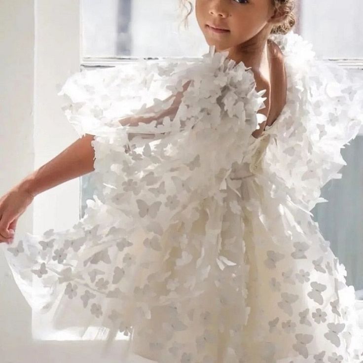 The perfect dress for special occasions this season! Fully lined cotton ball-gown silhouette dress with mesh/tulle overlay with adorable butterflies. Super puffy semi-transparent butterfly sleeves. Available in two colors. Available in girls' sizes 12M-12Y. Good things take time. Quicker shipping: this gorgeous dress ships directly from our overseas warehouse and will arrive to you in about 7-10 business days. *Limited Stock* Please note: contents will become wrinkly during shipping. Mariposa Dress, Tulle Material, Organza Dress, Butterfly Dress, Girls Dresses Summer, Gowns With Sleeves, Girls Party Dress, Dress Silhouette