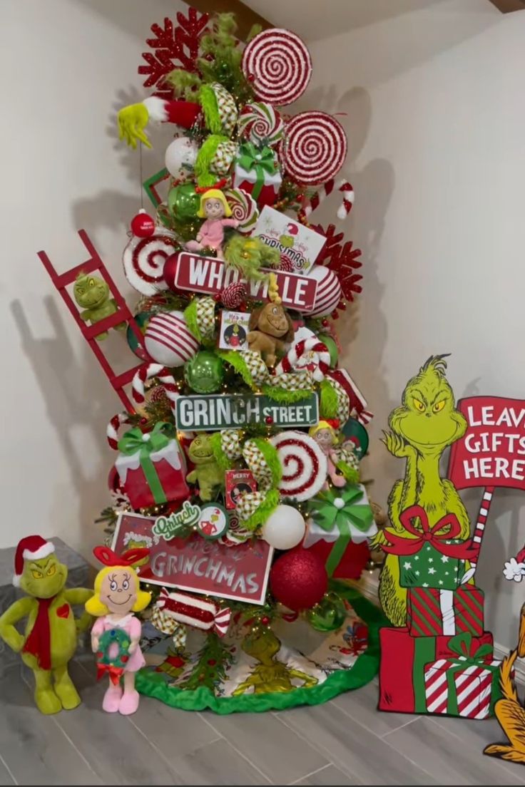 a christmas tree decorated with candy canes and lollipops