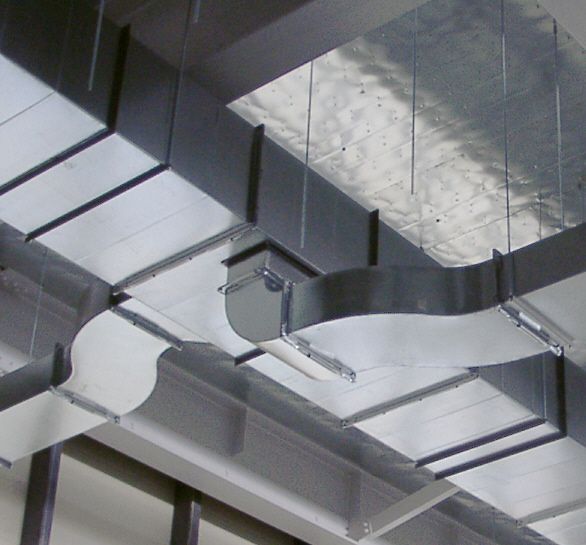 the underside of a ceiling with metal beams