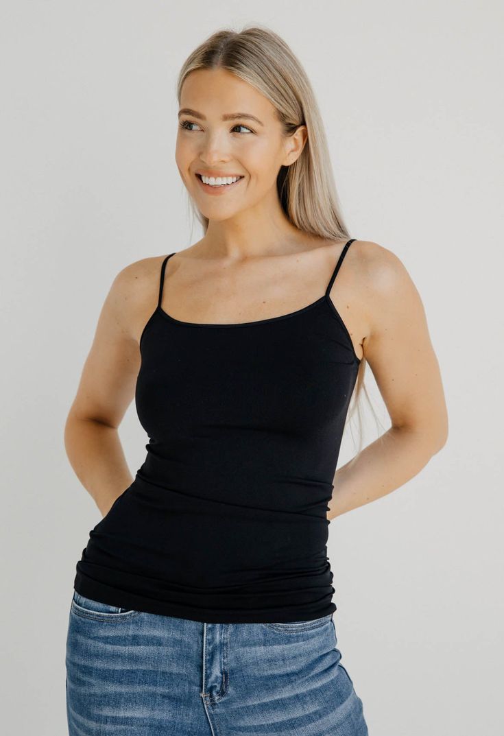 Style & Details: Signature Camisole Form Fitting Spandex Material - Stretchy Best Seller Great For Layering Sizing & Fit: Model is wearing one sizeModel Height: 5’8Waist: 26inHips: 34inBust: 34inBased on one size Fabric & Care: 92% Nylon8% SpandexHand Wash ColdHang or Lay Flat to DryITEM#: NS4011 Shipping: Free Shipping when you spend $100 or more!Orders below $100 will be charged $7 for standard shippingOrders typically ship within 1-3 business daysWe will gladly accept returns on items that ar Black Tank Tops, Best Seller, Lay Flat, Basic Tank Top, Fabric Care, Camisole Top, Fitness Models, Tank Top, Tank Tops