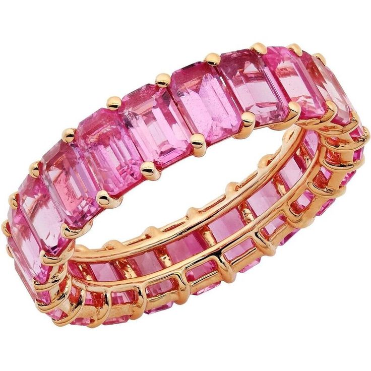 Indulge in the sweet and feminine beauty of the Dolce Ring in Pink Sapphire by Ruchi New York. This exquisite eternity band boasts a stunning 6.99 carats of sparkling pink sapphire, creating a truly show-stopping piece that is sure to turn heads. Perfect as an anniversary gift or a well-deserved treat for yourself, the Dolce Ring is the ultimate statement of luxury and elegance. Crafted with precision and attention to detail, this ring is the perfect representation of the Ruchi New York brand's Luxury Pink Jewelry With Prong Setting, Pink Diamond Stackable Rings, Pink Diamond Cut Ring, Pink Ruby Ring With Cubic Zirconia For Formal Occasions, Elegant Pink Sapphire Ring For Formal Events, Luxury Pink Ruby Promise Ring, Elegant Pink Ruby Promise Ring, Elegant Pink Ruby Ring For Anniversary, Pink Sapphire Ring Emerald Cut For Formal Occasions