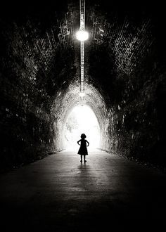 Low key black and white photo of girl in tunnel silhouetted against light at the end of the tunnel Alls Well That Ends Well, Low Key Photo, Chiaroscuro Photography, Low Key Photography, Newcastle Nsw, Digital Photography School, Hunter Valley, Nsw Australia, Chiaroscuro