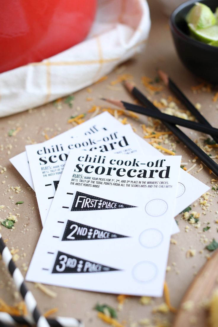 three coupons sitting on top of a table with chopsticks next to them