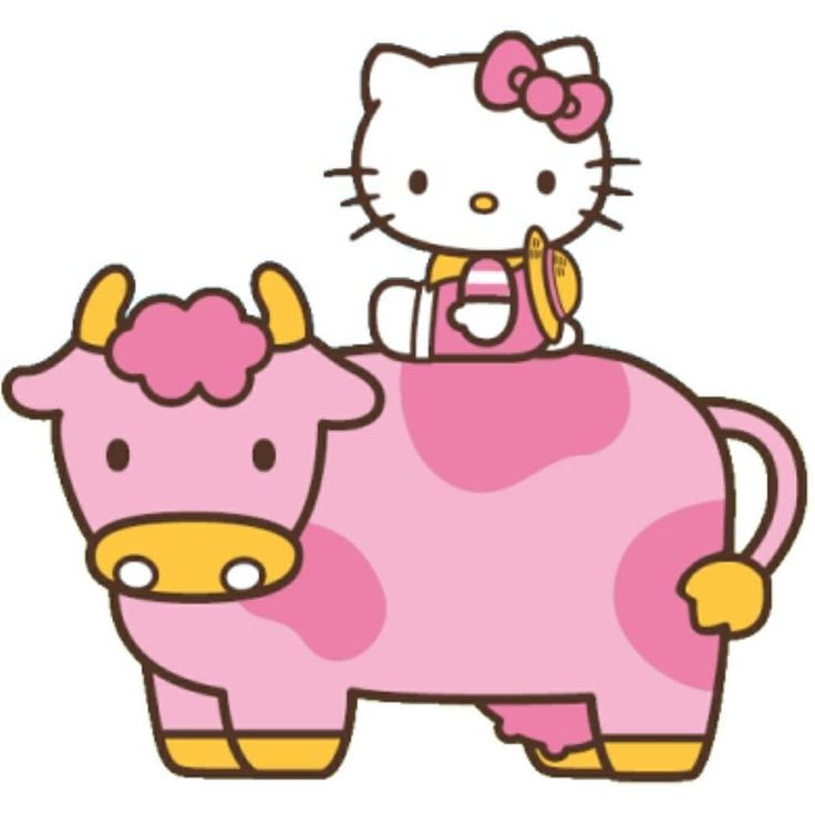 a hello kitty sitting on top of a pink cow