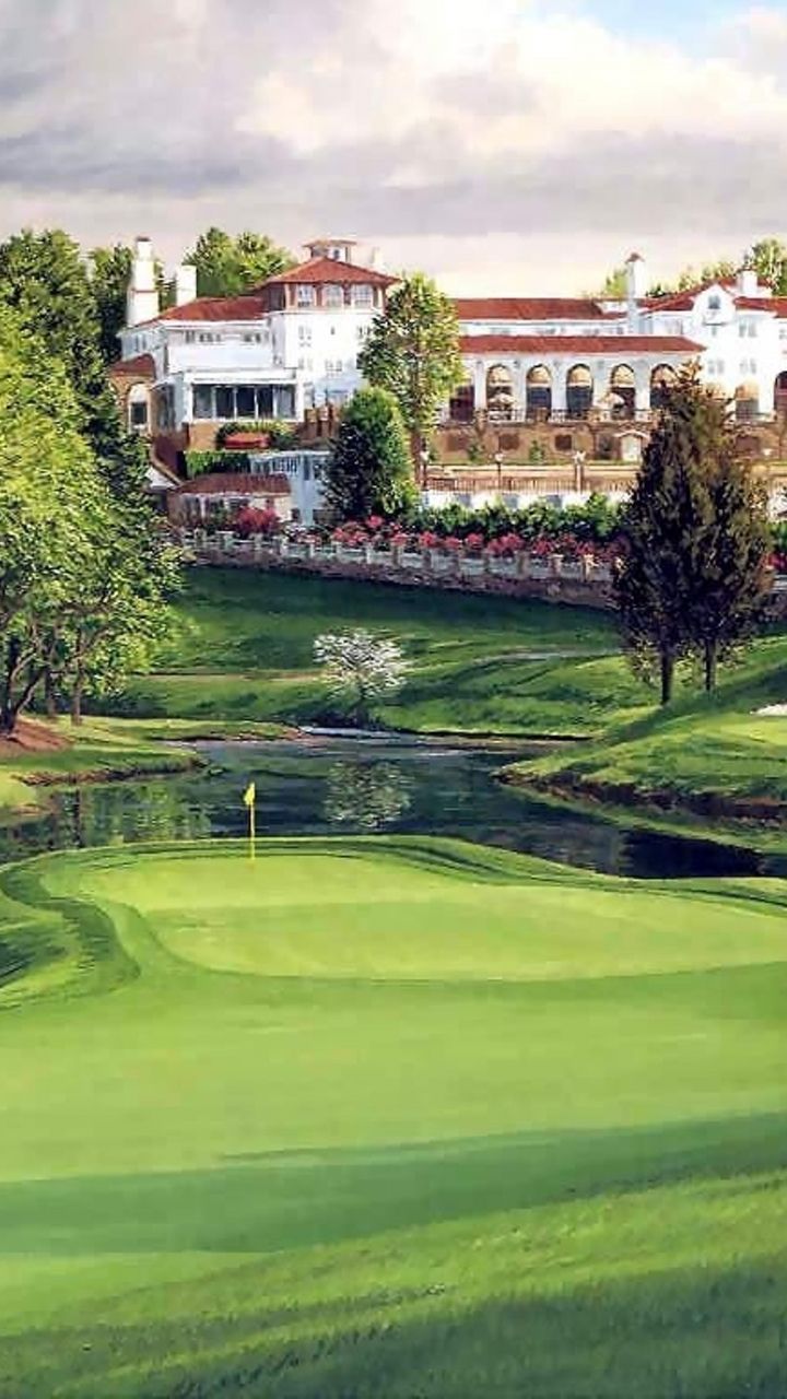 a painting of a golf course in front of a hotel