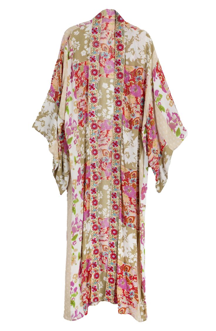 Hit the beach or kick it poolside in this flowy kaftan that features an allover floral pattern, kimono-inspired sleeves and an uneven hem. Kimono-inspired sleeves 100% rayon Hand wash, line dry Imported Multicolor Print Kimono For Spring Beach Cover-up, Multicolor Kimono Beach Cover-up, Long Printed Kimono For Beach Cover-up, Multicolor Long Robe For Vacation, Bohemian Robe With Floral Print And Kimono Sleeves, Bohemian Robe With Kimono Sleeves And Floral Print, Flowy Bohemian Robe For Vacation, Multicolor Beach Robe With Kimono Sleeves, Multicolor Printed Cover-up With Kimono Sleeves